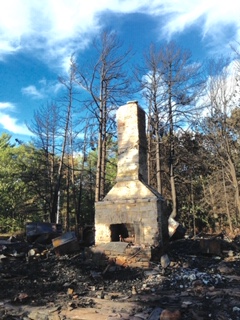 image of fireplace after fire consumed the cottage