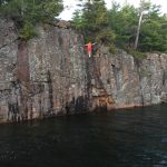 Picture of cliff diving in to the water